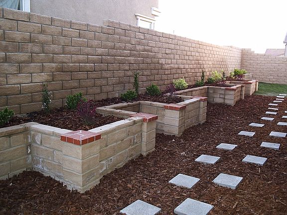 Custom planters in side yard
