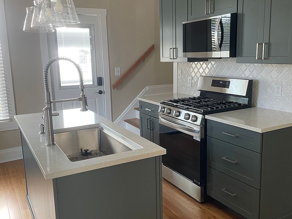 Kitchen- all new cabinets and Stainless appliances. Dishwasher is on the island