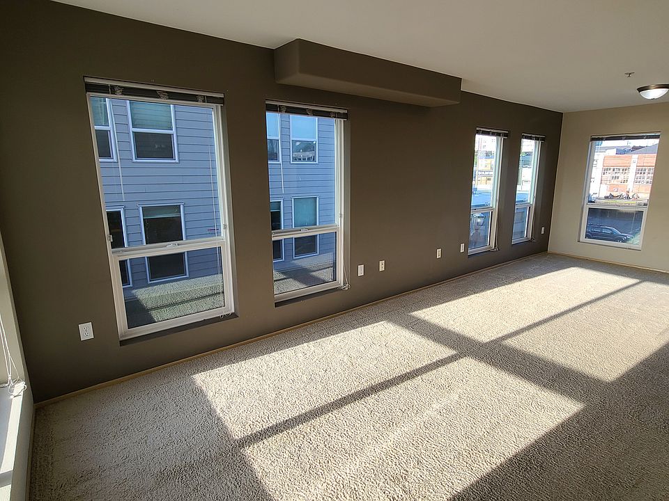 In the corner of the light and bright living room facing the city of Everett to the east. Enjoy the sunrise!