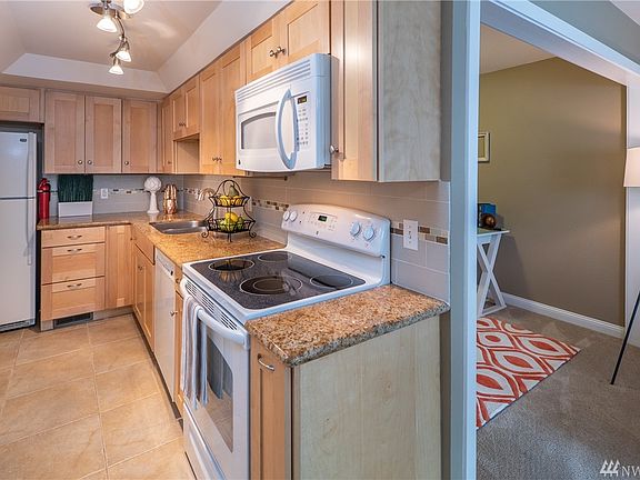 5th image of 13730 15th Ave NE #104G