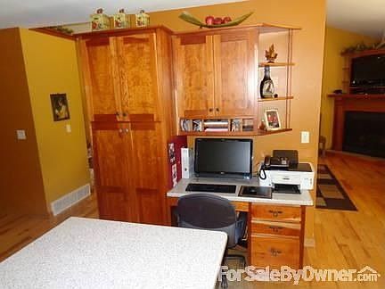 Kitchen
						:
						custom cherry cabinetry; corian countertops