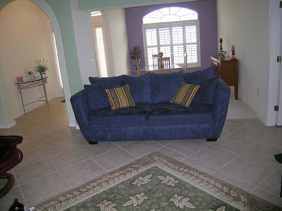 OPEN SPACE WITH LOTS OF DIAGIONAL CERAMIC TILE FLOORS