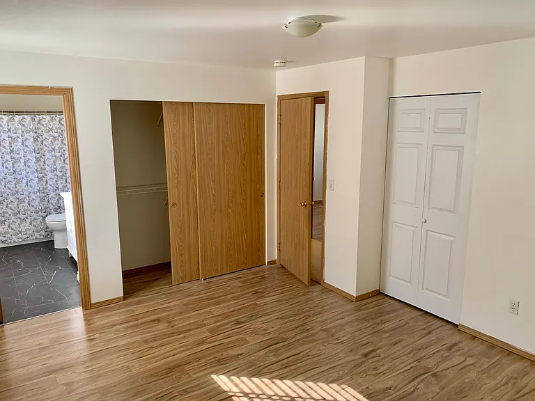 Master bedroom with 2 closets and en-suite bathroom