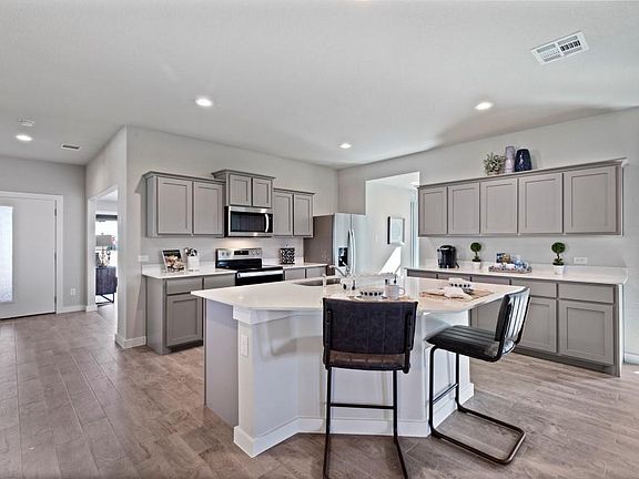 Kitchen - All Home and community information, including pricing, included features, terms, availability and amenities, are subject to change at any time without notice or obligation. All Drawings, pictures, photographs, video, square footages, floor plans, elevations, features, colors and sizes are approximate for illustration purposes only and will vary from the homes as built.