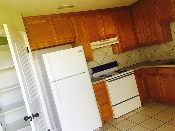 Kitchen & a large closed in pantry