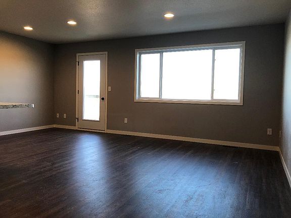 open living door to upper balcony