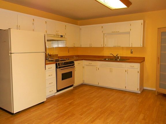 The refrigerator and range/oven will remain for the new owners.