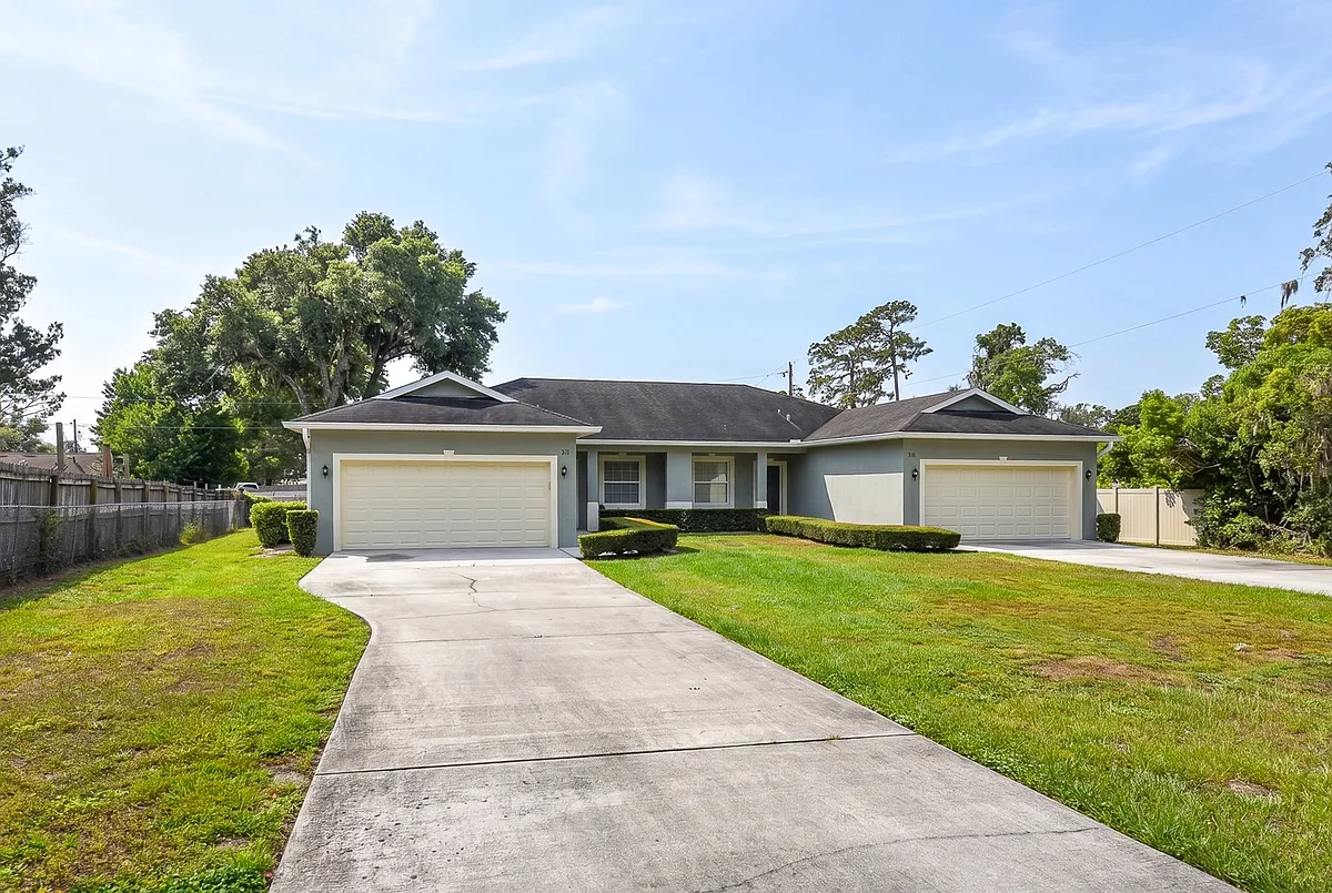 Each unit has it's own 2 car garage and dedicated driveway. No sharing driveways. - 211 Gene Gables Cir