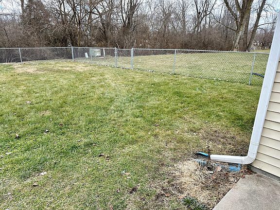 Fully-fenced back yard shared with 990 side of duplex