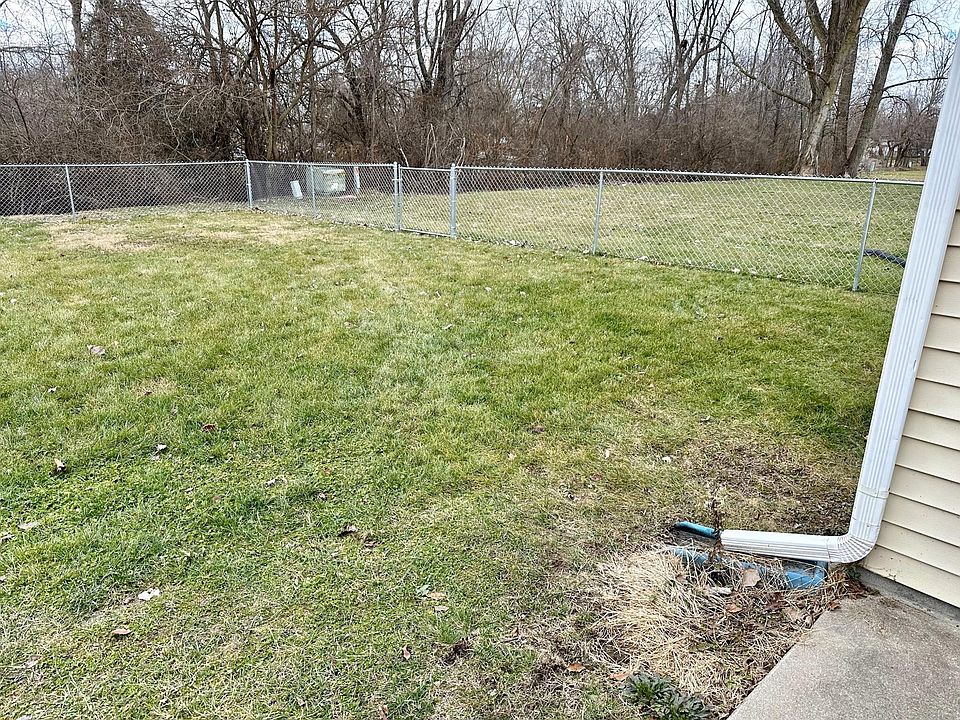 Fully-fenced back yard shared with 990 side of duplex