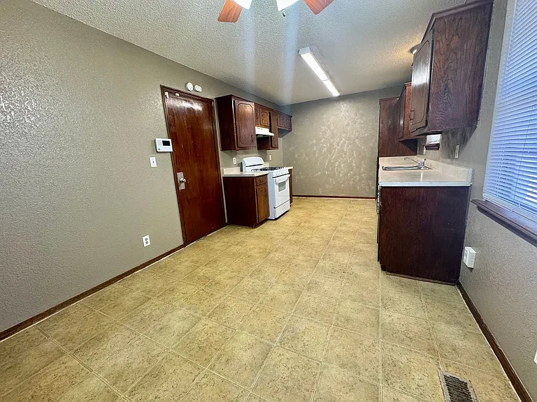 1403 S 121st East Ave — Photo 5