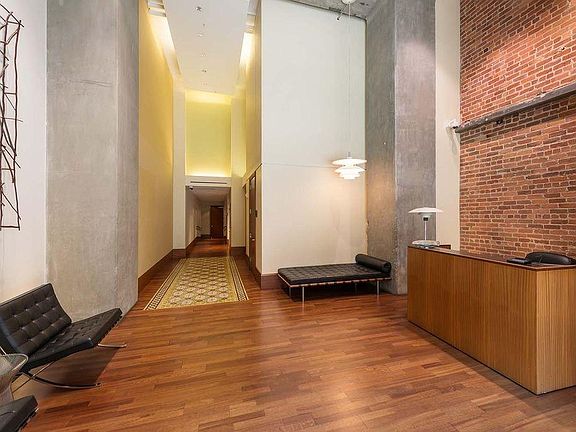 25-foot high grand lobby with mid-century modern furniture