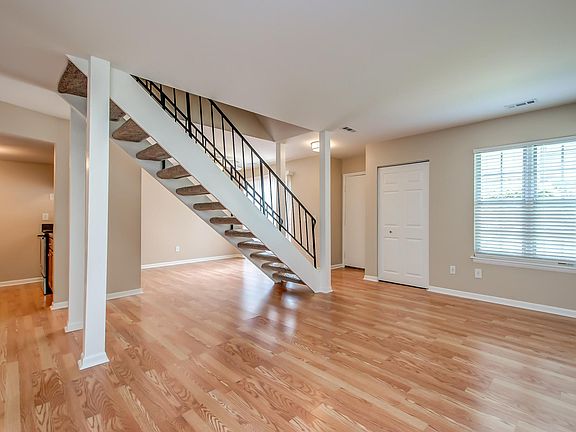Living Room looking into Kitchen and Dining