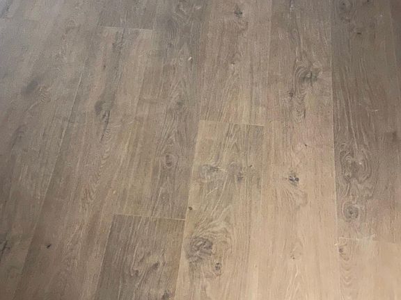 Porcelain tile flooring through bathroom and kitchen