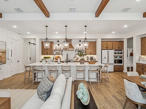 Kitchen with matte black pendant lighting