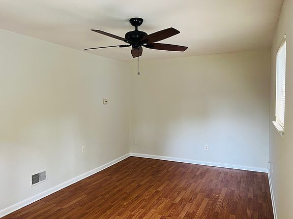 Freshly Painted Living Room with ample sunlight