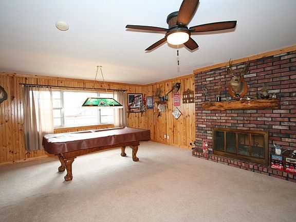 Gameroom w/see thru Fireplace from Den