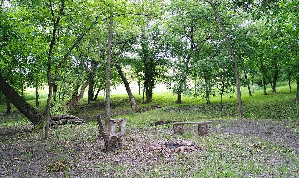 Behind the second tree line