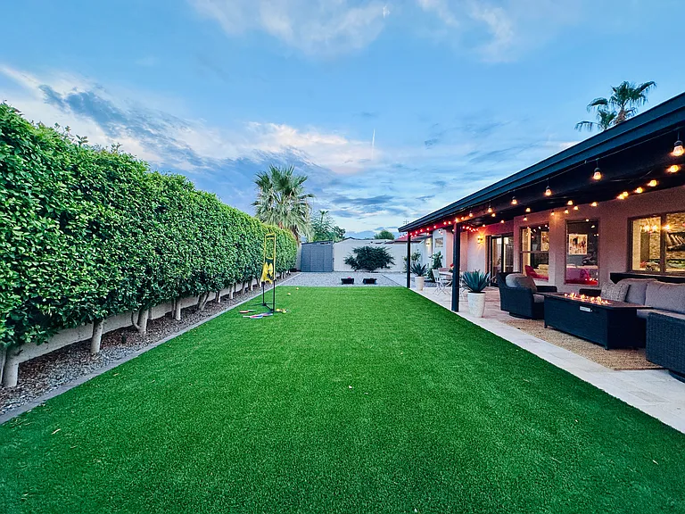 Private Backyard Oasis: 
Fully fenced yard equipped with a BBQ grill, dedicated outdoor dining area, and a comfortable sitting space_perfect for al fresco dinners and evening relaxation.