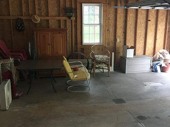Attached garage. Room for one car.