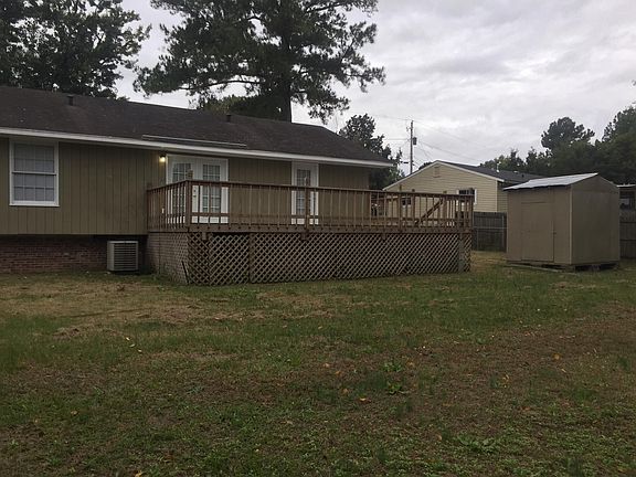 Rear view Large deck and storage shed