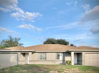 725 Ivan Ave S, Lehigh Acres, FL 33971