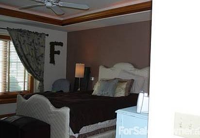 Master Bedrom
						:
						Master suite on main level has a large attached bath with 3 closets!!