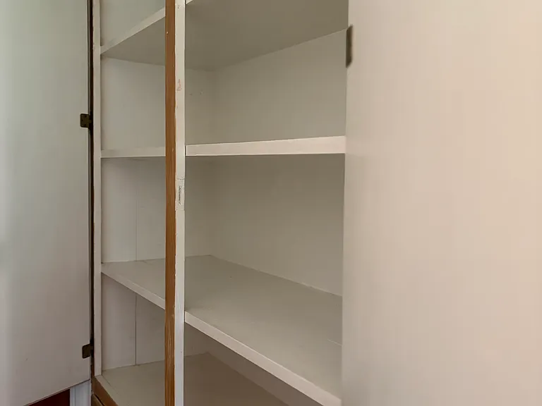 bathroom storage cabinet with open doors