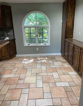 Stone tile eat in dining with extra storage