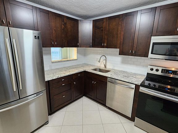2nd image of 308-4700 Washington St #308