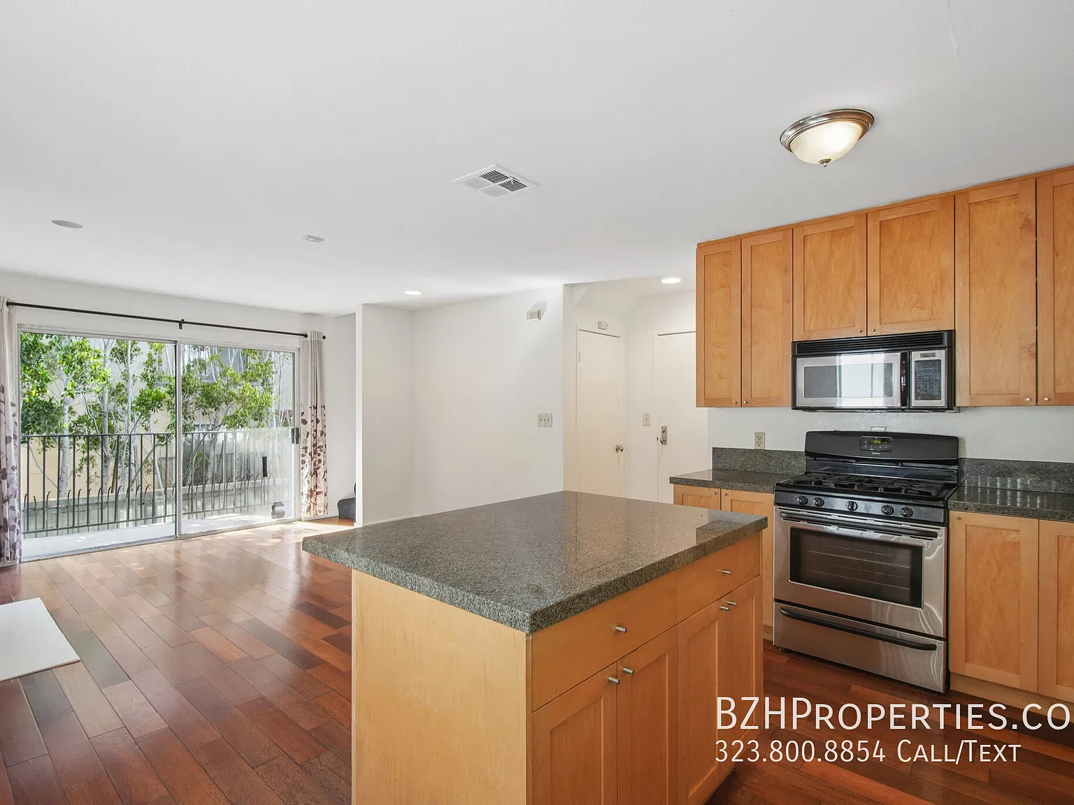 Bright Two-Story Townhome with Fireplace, Balcony & 2-Car Garage Parking — Photo 4