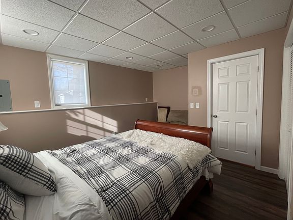 photo of the same bedroom from a different angle