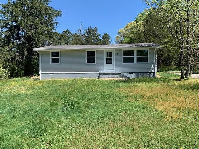 Large front and back yard, new siding and windows, asphalt drive with plenty of parking, mature trees, plenty of privacy, quiet area with good neighbors.