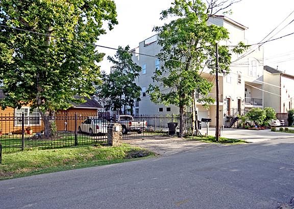 Lot nestled between new construction