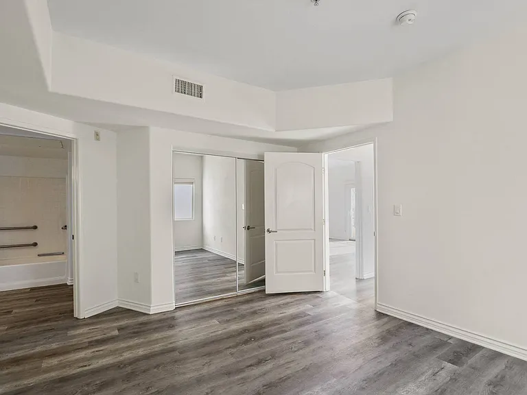 Large-Size Bedroom with Bathroom, Closet, and Vinyl Flooring