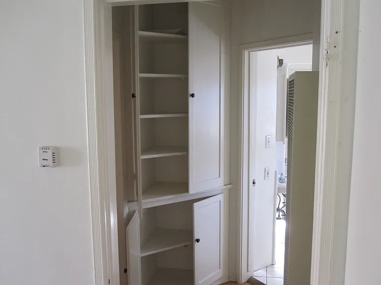 Hallway leading into bathroom