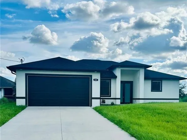 828 Portland ST E, LEHIGH ACRES, FL 33974