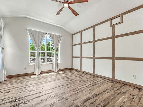 Custom board and batten in Master Bedroom.