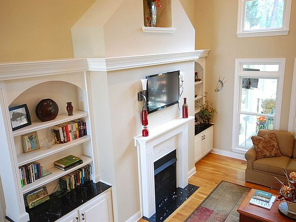 CUSTOM BUILT CABINETRY WITH FIREPLACE