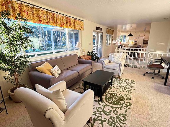 Main Level Additional Living Space, Kitchen, Sliding Door to Deck