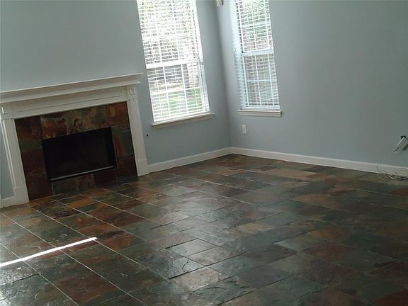 Large Den all slate floors on 1st floor.