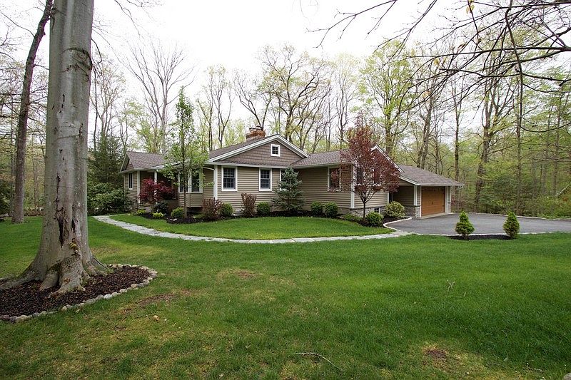 Front yard
						:
						Blue stone path and large front yard