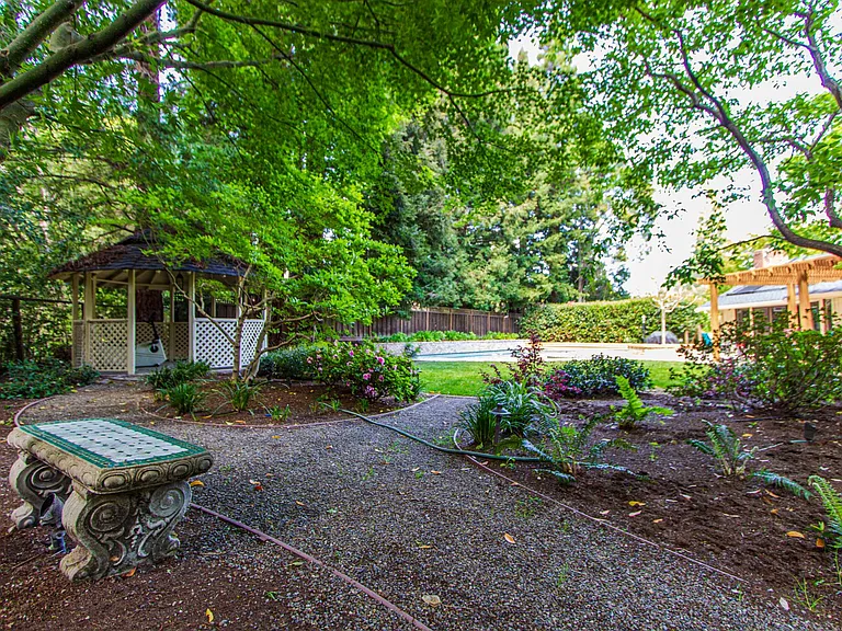 Expansive yard with meandering garden paths
