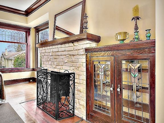 Period detailing:  leaded windows, built-ins, stained mouldings.