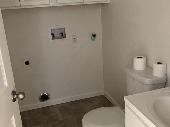 Downstairs half bath with washer dryer hookups