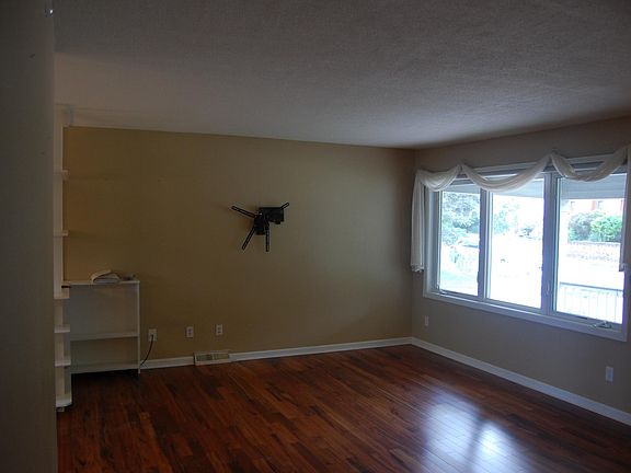 Spacious Living Room open to dining/kitchen.