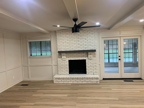 family room, open to kitchen and front room