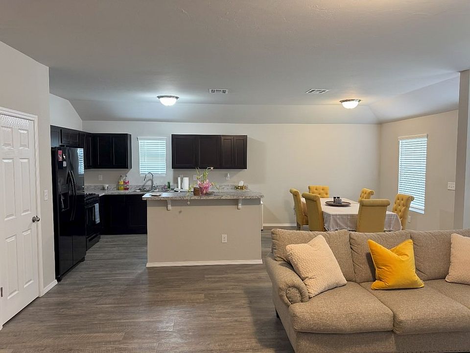 Study at the table and stay connected to your friends in the living room and kitchen.