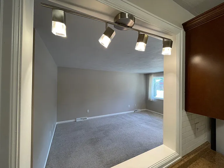 Pass through window to living room from kitchen.