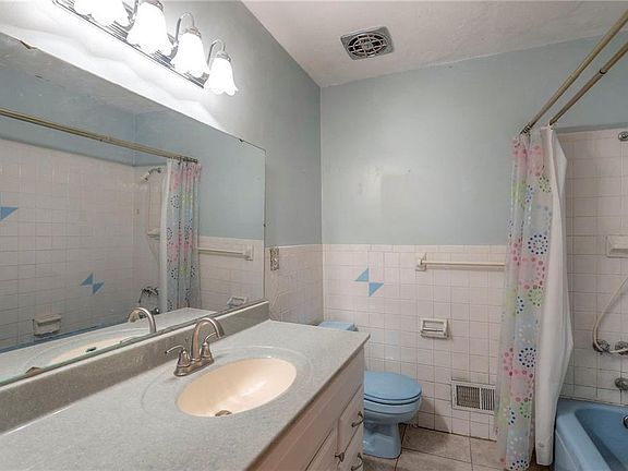 5th image of 8428 James A Reed Rd